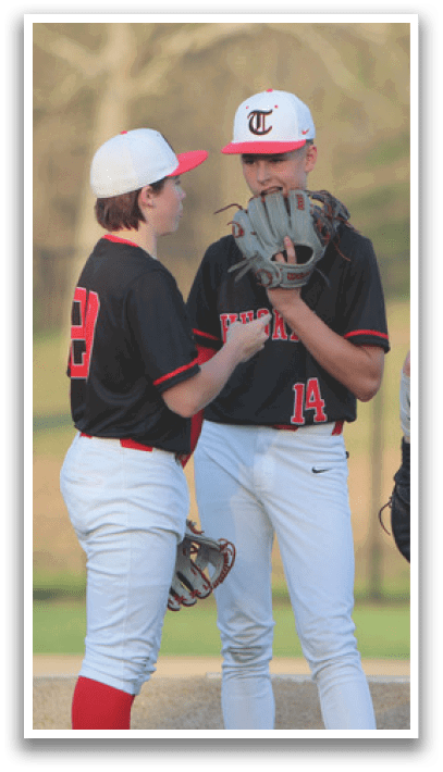 Three young men wearing baseball uniforms are standing on a field. One of them is holding a baseball glove. AI generated content