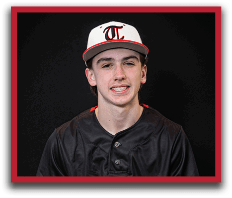A young man wearing a baseball uniform is sitting on a stool. AI generated content