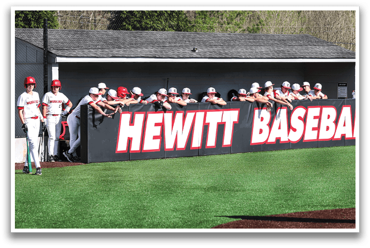 A group of baseball players are standing in front of a sign that says “Hewitt Baseball." AI generated content