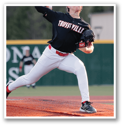A baseball player in a black shirt and red hat is pitching a ball on a field. AI generated content