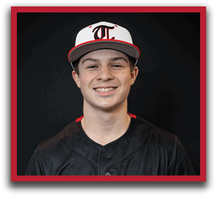A young man wearing a baseball uniform with the word “Huskies" on the front. AI generated content