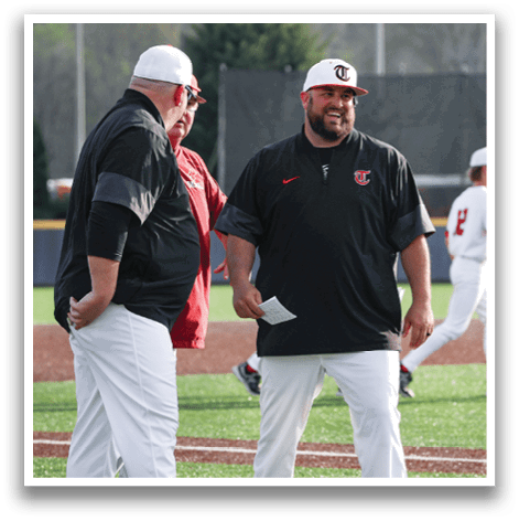 Two men wearing baseball uniforms are talking to each other on a baseball field. AI generated content