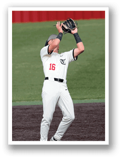 A baseball player catches a ball in a game. AI generated content