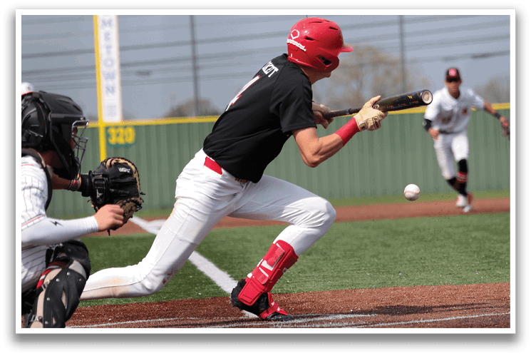 A baseball player in a black shirt and red helmet is swinging a bat at a ball. AI generated content