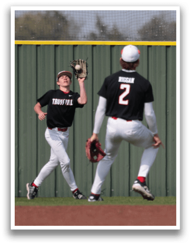 Two baseball players are on the field, one catching a ball and the other running. AI generated content