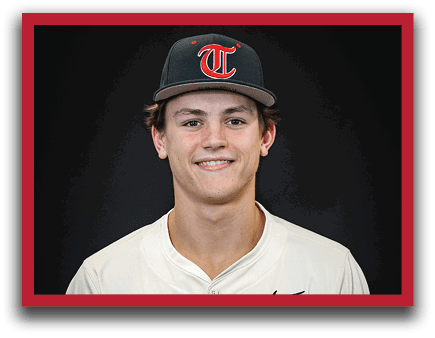 A young man wearing a baseball uniform and a black hat with the letter T on it. AI generated content