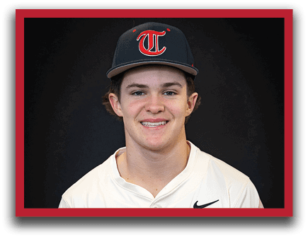 A young man wearing a baseball uniform and a cap with the letter T on it. AI generated content