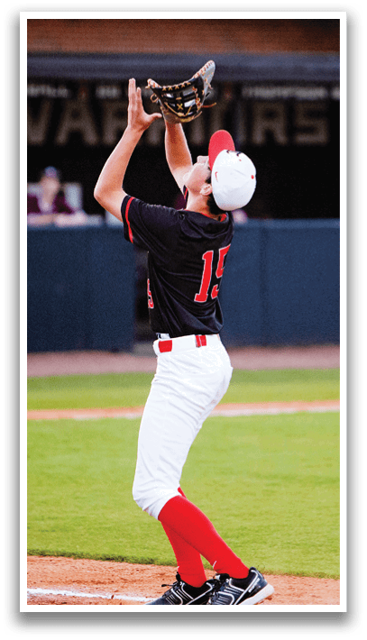 A baseball player wearing a black and white uniform is reaching up to catch a ball. AI generated content