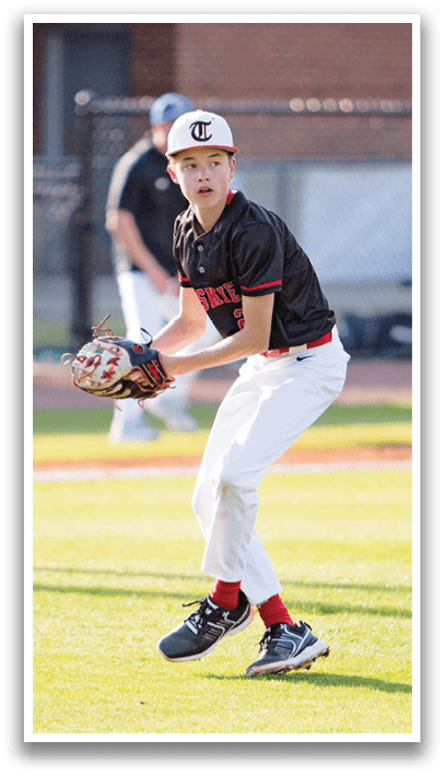 A young man in a baseball uniform is standing on a field, holding a baseball glove. AI generated content