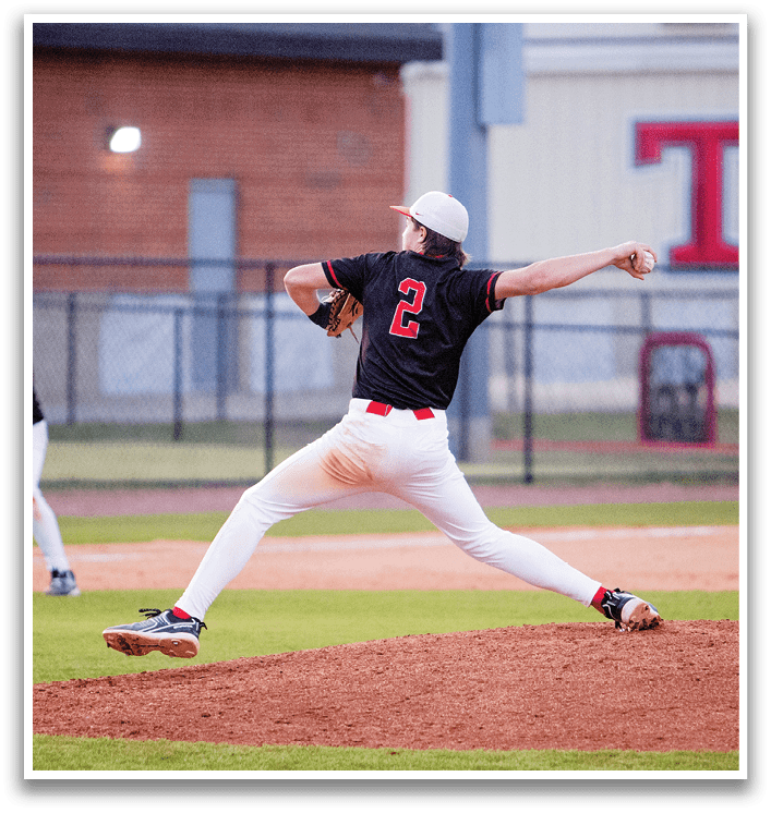 A baseball player in a black shirt and white pants is pitching a ball on a field. AI generated content