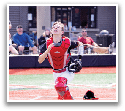 A baseball player in a red shirt and white pants is running towards a base. AI generated content
