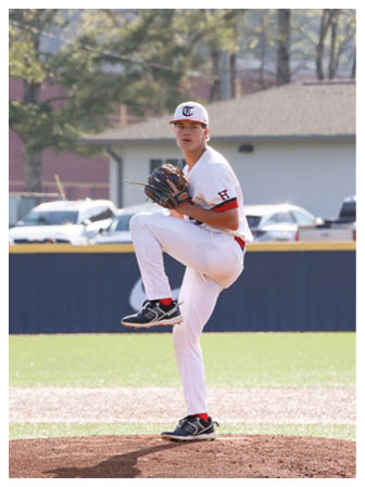 A baseball player in a white uniform is on the pitcher's mound, getting ready to throw the ball. AI generated content