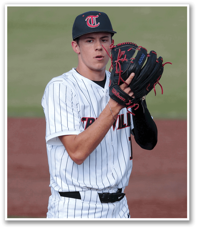 A baseball player wearing a black and white uniform holds a catcher's mitt. AI generated content