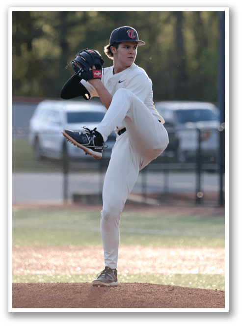 A baseball player in a white uniform is on the mound, getting ready to throw the ball. AI generated content