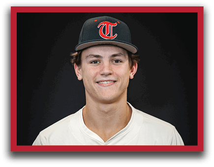 A young man wearing a baseball uniform and a black hat with the letter T on it. AI generated content