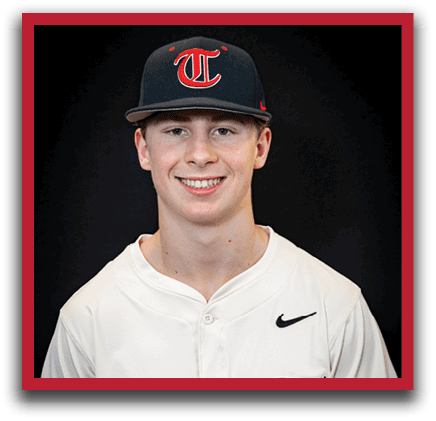 A young man wearing a baseball uniform and a black hat with a red T on it. AI generated content