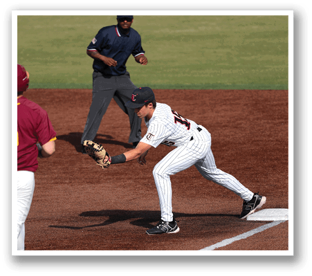 A baseball player is sliding into a base while the catcher tries to tag him out. AI generated content