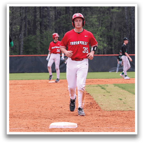 A baseball player wearing a red jersey is running to the base. AI generated content