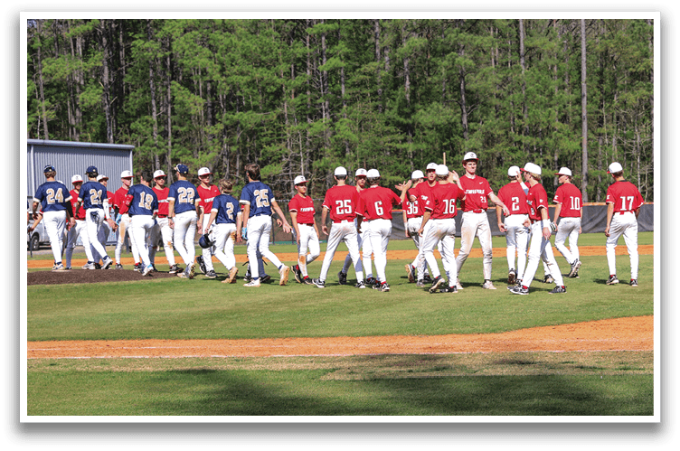 A group of baseball players wearing red and blue uniforms are walking across a field. AI generated content