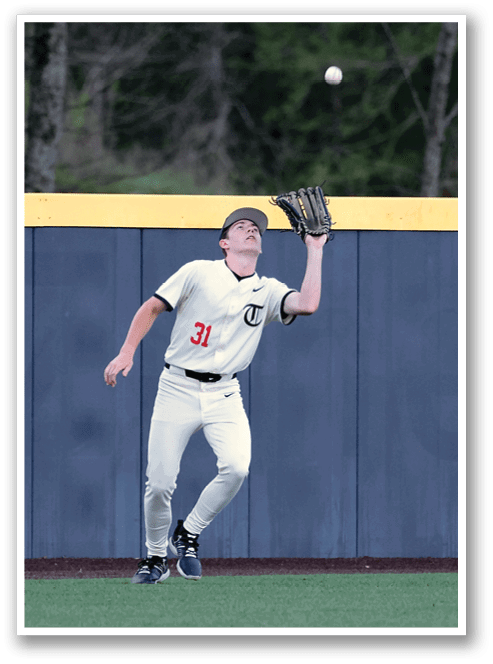 A baseball player in a white uniform is catching a ball. AI generated content