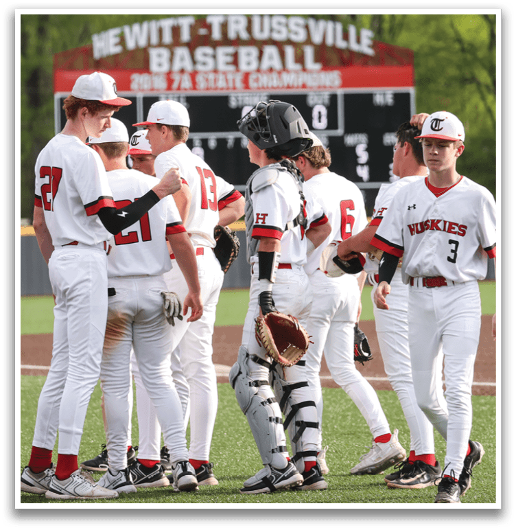 A group of baseball players wearing white uniforms are standing on a field. AI generated content