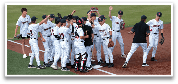 A group of baseball players huddle on the field, celebrating a win. AI generated content