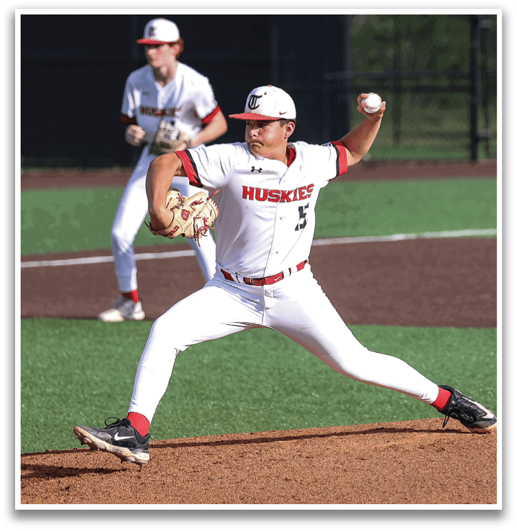 A baseball player in a white uniform is pitching a ball on a field. AI generated content
