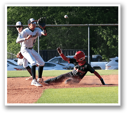 A baseball player slides into home plate while another player tries to catch the ball. AI generated content