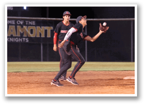 A baseball player catching a ball in a game. AI generated content
