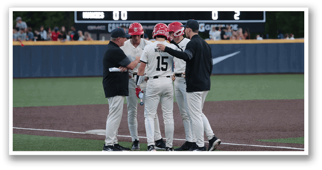 Baseball players huddle on the field, with one player wearing a red helmet. AI generated content