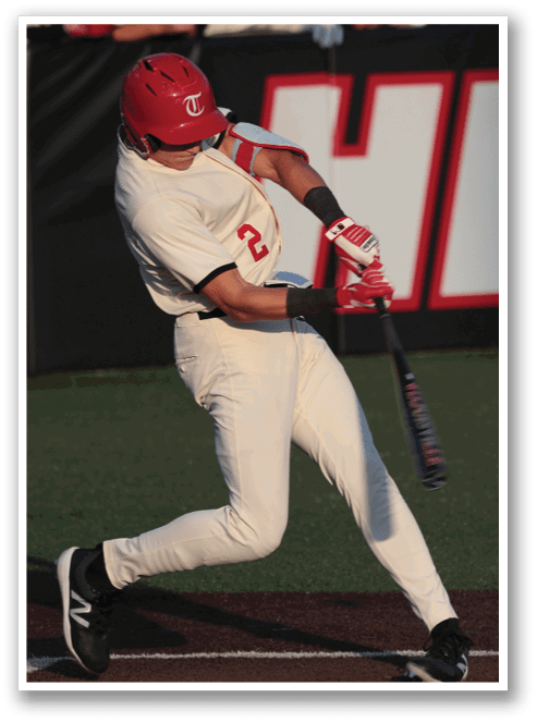 A baseball player in a white uniform is swinging a bat at a ball. AI generated content