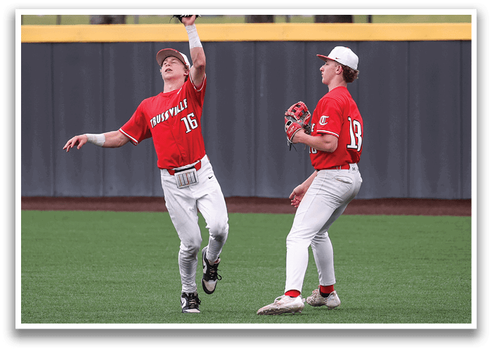 Two baseball players are leaping in the air to catch a ball. AI generated content