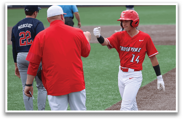 A baseball player wearing a red jersey with the number 14 shakes hands with a coach. AI generated content