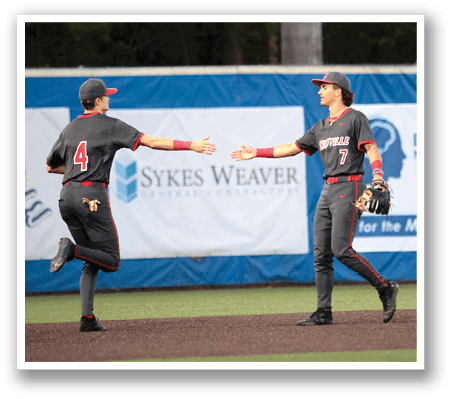 Two baseball players shake hands on the field. AI generated content