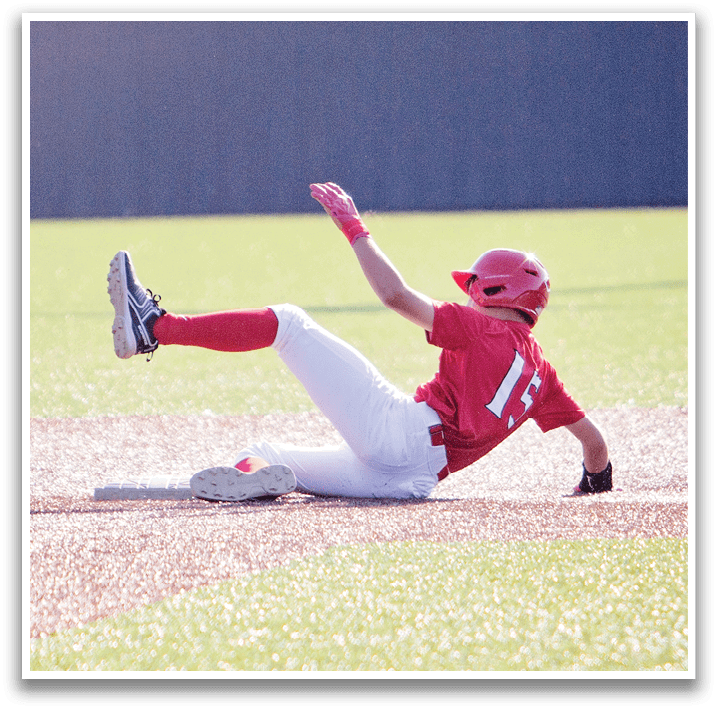 A baseball player slides into a base while another player tries to catch the ball. AI generated content