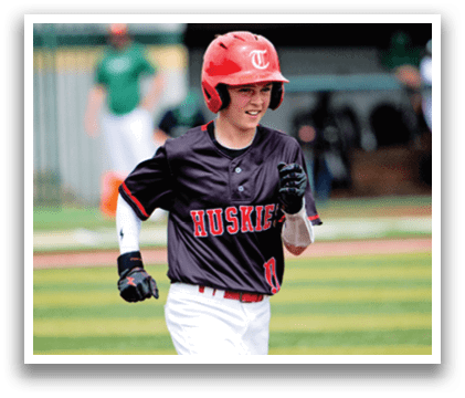 A young boy wearing a baseball uniform is running on a field. AI generated content
