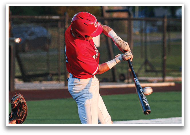 A baseball player in a red shirt and white pants is swinging a bat at a ball. AI generated content