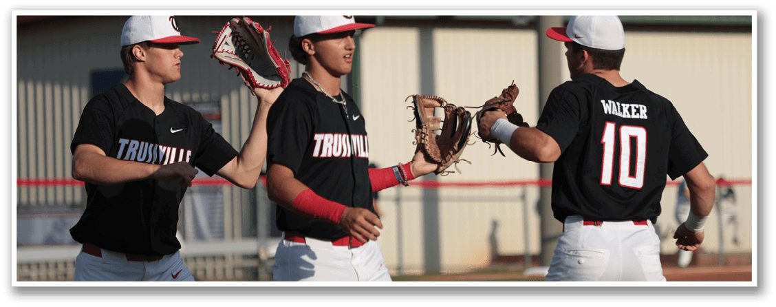 Three baseball players wearing black shirts and white pants are standing on a field. They are holding baseball gloves and talking to each other. AI generated content