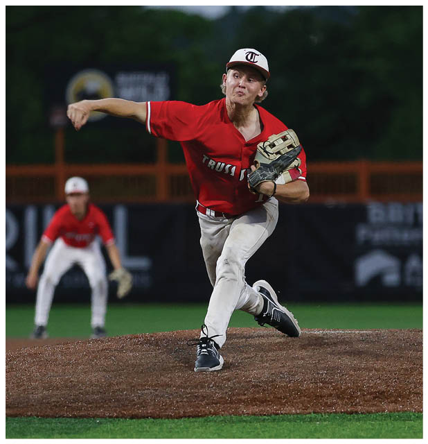 A baseball player in a red shirt and white pants is pitching a ball. AI generated content