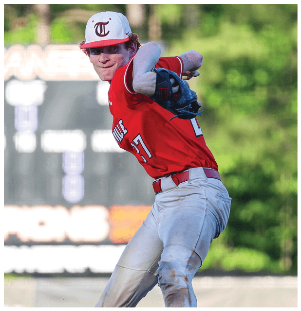 A baseball player in a red shirt and white pants is throwing a ball. AI generated content