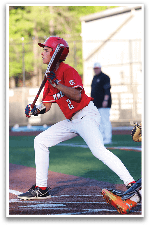 A baseball player in a red shirt and white pants is holding a bat and preparing to swing at a ball. AI generated content