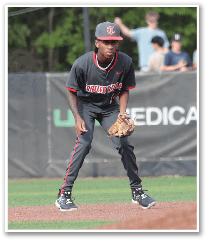 A baseball player is standing on the field, wearing a black shirt and holding a baseball glove. AI generated content