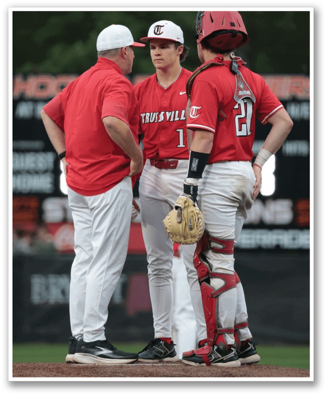 Three men in red and white uniforms are standing on a baseball field, talking to each other. AI generated content