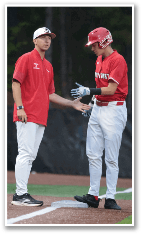 Two baseball players shake hands on the field. AI generated content