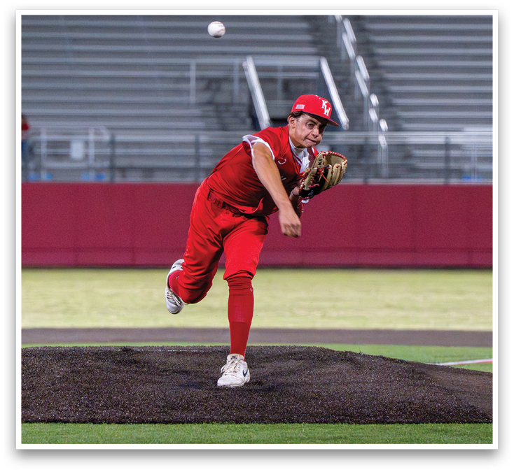 A baseball player in a red uniform is pitching a ball. Description generated by AI
