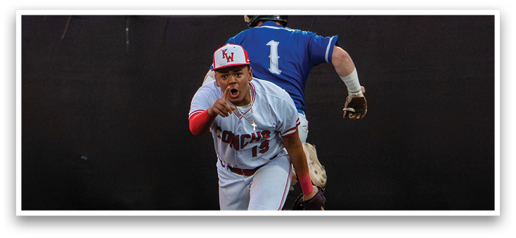 A baseball player wearing a red and white uniform is running to a base. Description generated by AI