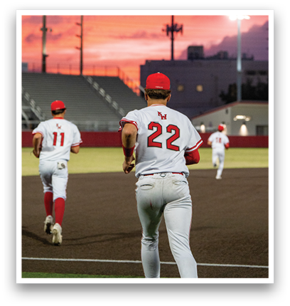 A baseball player wearing a red and white uniform. Description generated by AI