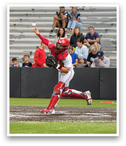 A baseball player is throwing a ball. Description generated by AI