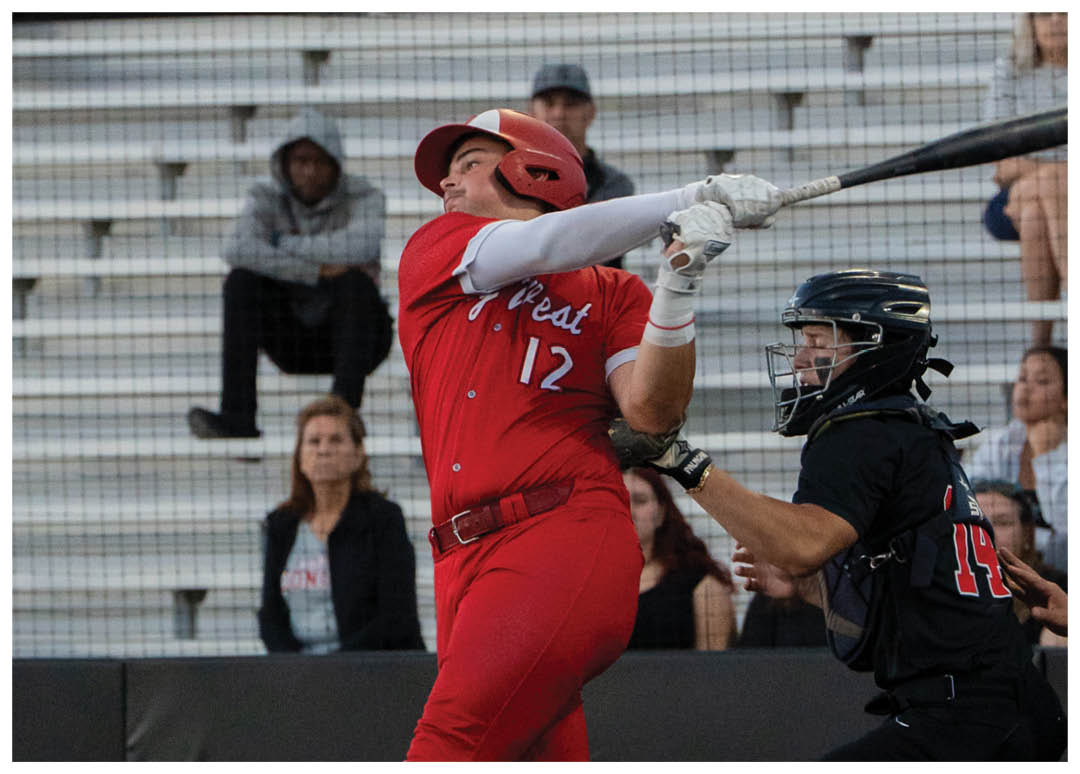 A baseball player in a red jersey is swinging a bat. Description generated by AI
