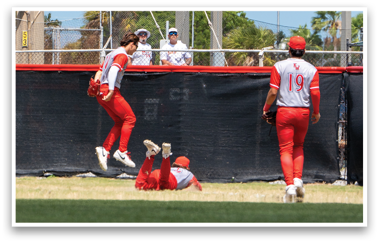 A baseball player is sliding into a base. Description generated by AI